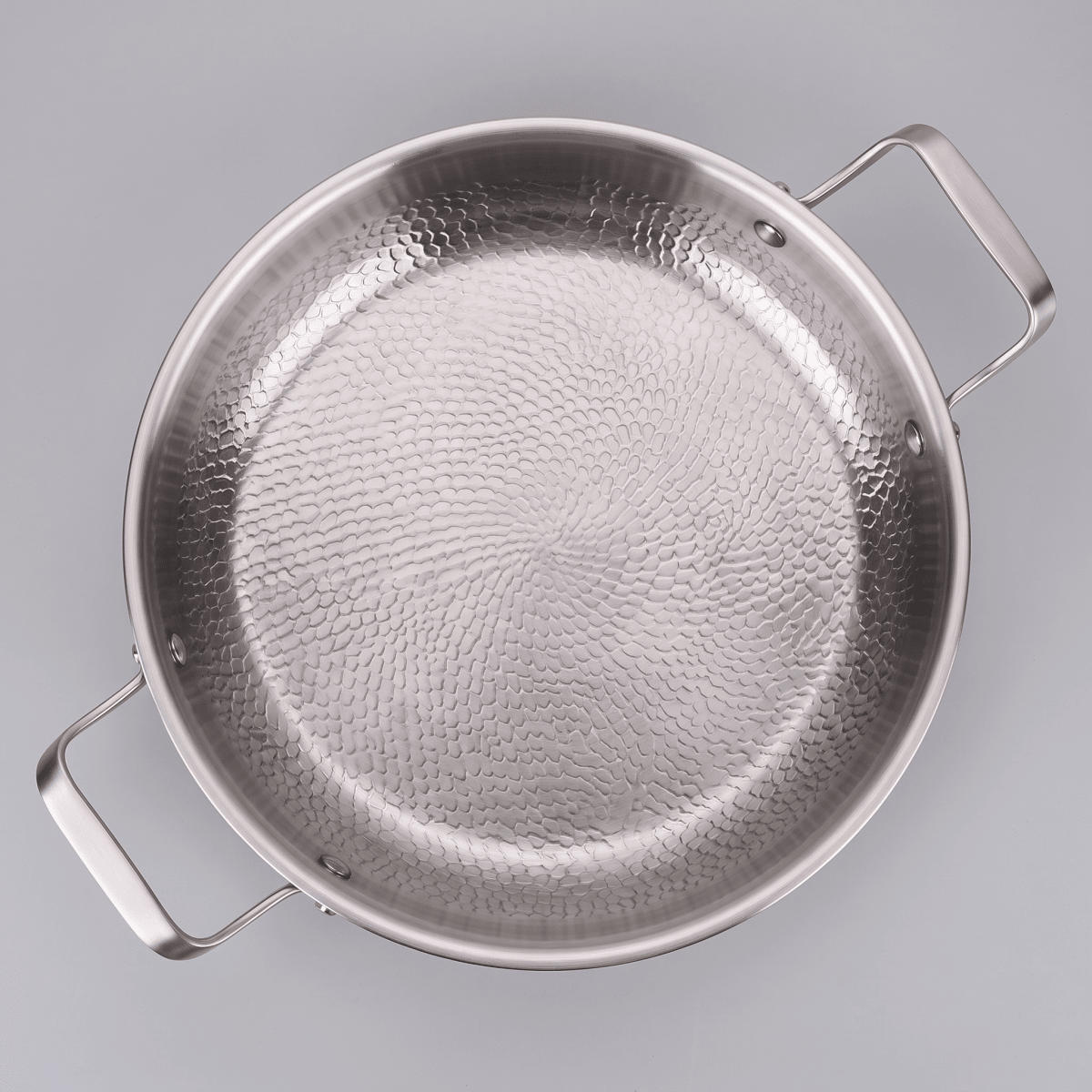 Detail of Forged Hammered Dual-Handle Pan interior surface