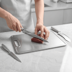 Fenn butcher knife in use, cutting meat
