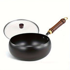 Fenn cast iron pot with glass lid open, studio view