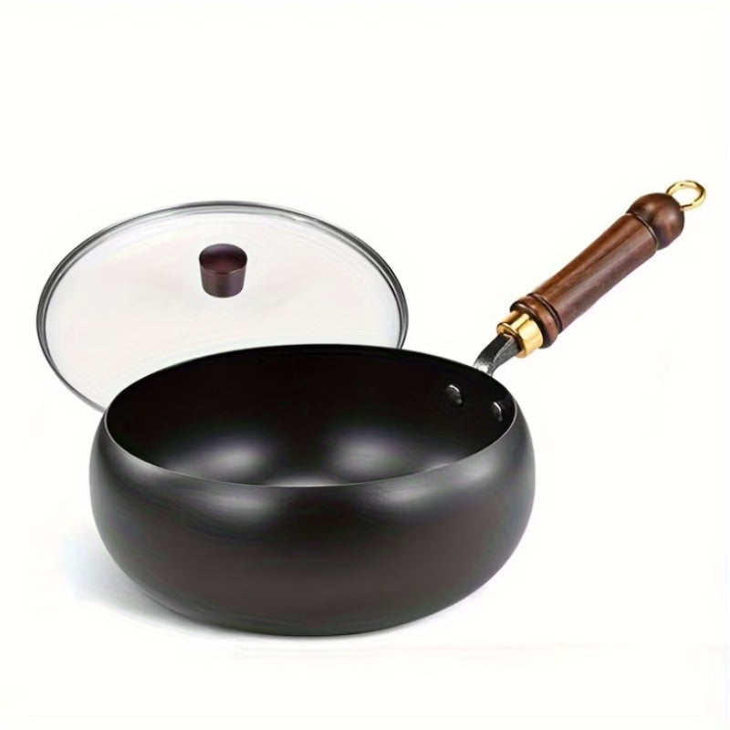 Fenn cast iron pot with glass lid open, studio view