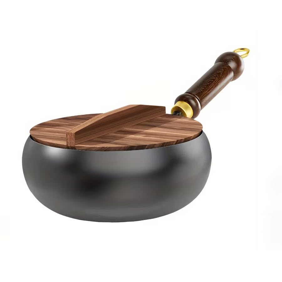 Fenn cast iron pot with wooden lid, studio view