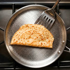 Fenn hammered crêpe pan cooking a crêpe on the stovetop