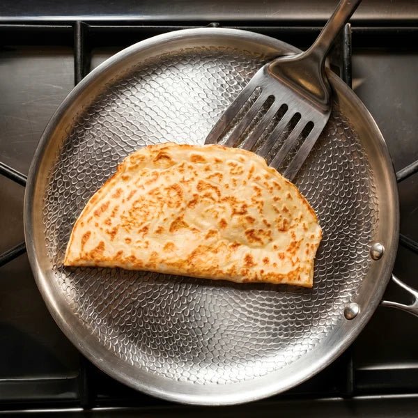 Fenn hammered crêpe pan cooking a crêpe on the stovetop