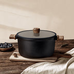 Fenn non-stick pot styled on a wood table with fresh blueberries