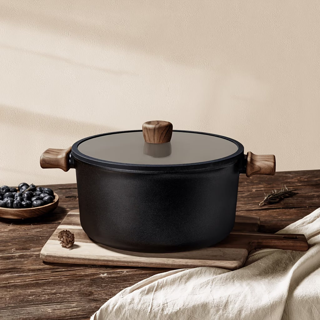 Fenn non-stick pot styled on a wood table with fresh blueberries