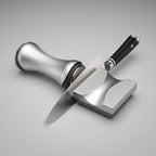 Fenn rolling knife sharpener sharpening a knife blade
