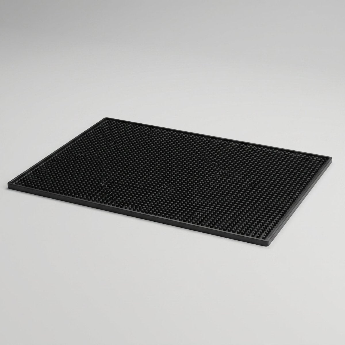 Fenn silicone counter mat in use under a cutting board