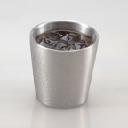 Fenn stainless steel cup filled with an iced drink