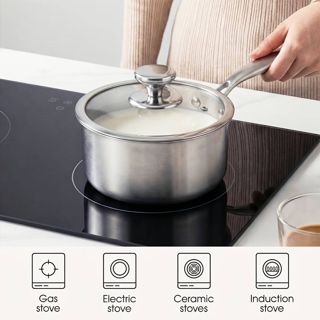 Fenn tri-ply stainless steel pot warming milk on the stovetop